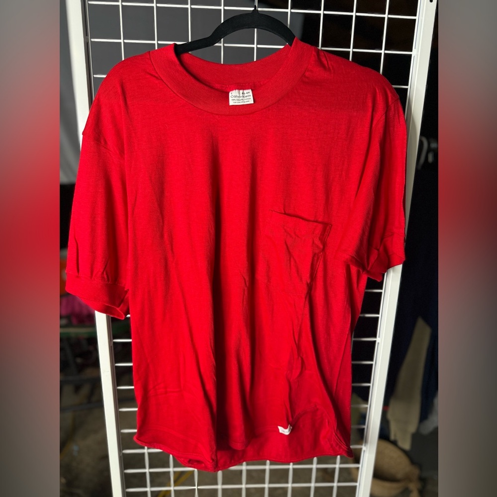 Vintage early 90s Calvin Klein t-shirt with pocket.